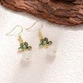 Green Flower and White Round Bead Gold Tone Hook Earrings view 3