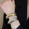 Seventeen Duplicate Gold Or Silver Ripple Faceted And Openwork Cuffs view 4
