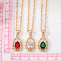 Gold Tone Crystal Teardrop Pendant Necklaces in Green Red and Clear view 5