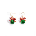 Bow and Jingle Bell Holiday Hook Earrings in Red and Green view 5
