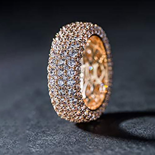 Second product view showing multi-row pave full eternity wide ring in three metal tones