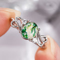 Green Patterned Oval Stone Infinity Ring In Silver Tone view 2