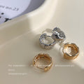 Faceted Sculptural Huggie Hoop Earrings In Gold And Silver Tone view 4