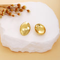 Thirty Gold Tone Sculptural Leaf Heart Shell and Geometric Earrings view 2