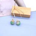 Gold Tone Long Wire Textured Resin Ball Drop Earrings view 6