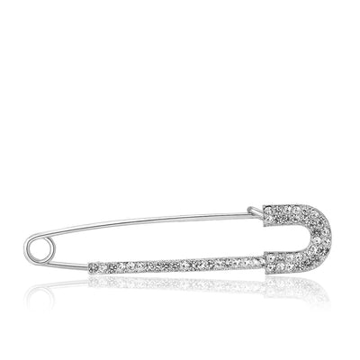 Front view of oversized crystal safety pin brooch in gold and silver tone