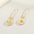 Gold Tone Round Clear Resin Flower Drop Earrings in Three Designs view 5