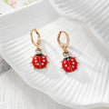 Gold Tone Red Ladybug Huggie Earrings in Six Designs view 6