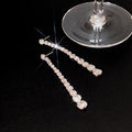 Silver Tone Graduated Clear Stone Long Stud Earrings view 3