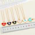 Gold Tone Butterfly Frame Evil Eye Pendant Necklaces in Six Colors view 2