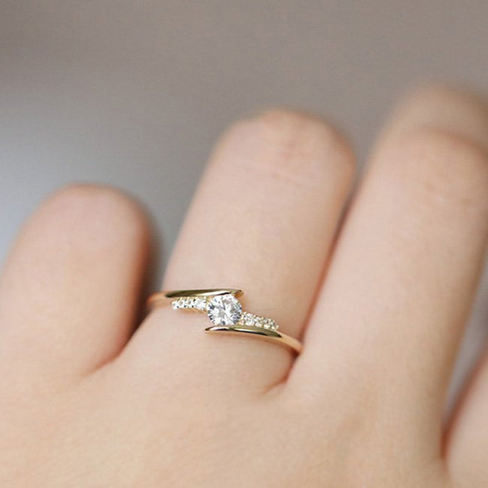 Gold Crossed Band Clear Center Stone Ring Metal Alloy