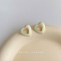 Cream Enamel Hollow Heart Stud Earrings Gold Rim Pair view 3