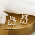 Clear Look Bow Outline Gold Tone Statement Stud Earrings view 2
