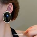Gold Tone Oval Resin Stud Earrings in Black and Burgundy view 3
