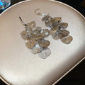 Layered Metal Petal Hook Earrings In Gold And Silver view 7