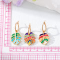 Gold Tone Enamel Monstera Leaf Huggie Earrings in Three Colors view 5