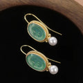 Gold Tone Green Oval Carved Pearl Drop Hook Earrings view 2