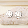 Open Smiley and Frowning Face Stud Earrings in Two Finishes view 4