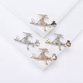 Crystal Girl on Broom Brooch in Four Gold and Silver Finishes view 1