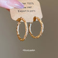 Gold Tone Twisted Medium Hoop Earrings with Detailed Finish view 4