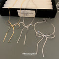 Bow Snake Chain Necklace and Multi Bow Bracelet Styles view 1