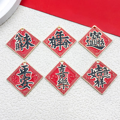 Metallic assorted shape charms arranged on a light background