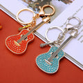 Jeweled Guitar Keychains in Red and Blue Pictured Colors view 3