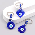 Silver Tone Blue Glass Evil Eye Clip Keychains in Five Shapes view 2
