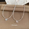 Blue Beaded Rocking Horse Necklace with Distinctive Textured Details view 3