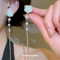 White Flower Pearl Threader Clip-On Earrings with Polished Metal Details view 3