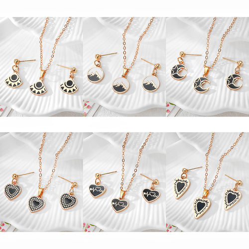 Six black gold enamel heart mountain moon and fan necklace earring sets grid