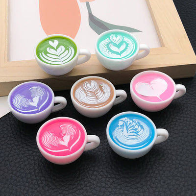 Multicolor heart charms shown in a close-up product view