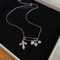Butterfly and Cross Charm Necklaces in Four Mixed Designs view 9