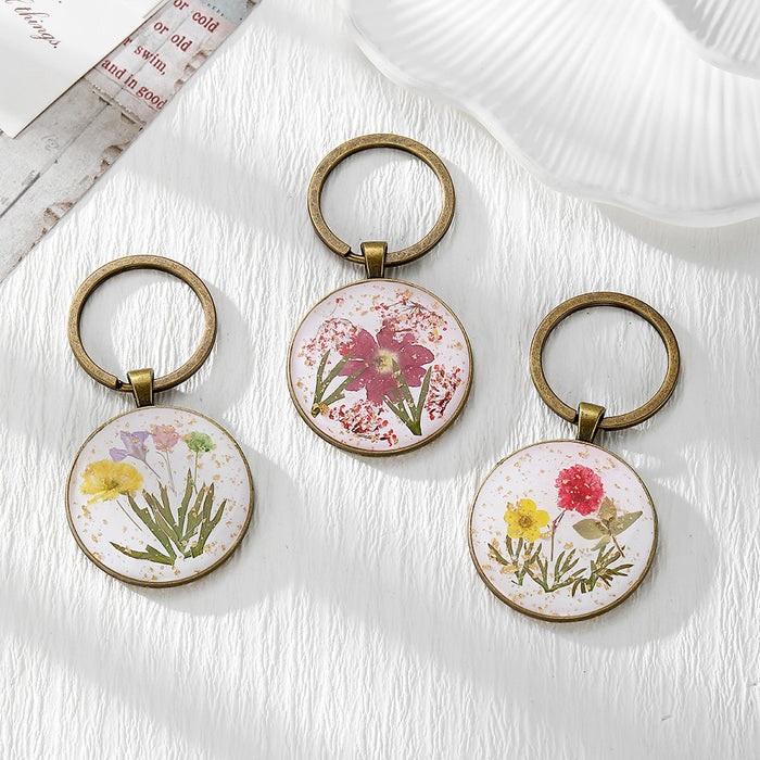 Antique Bronze Round Pressed Flower Split-Ring Keychains in Three Designs