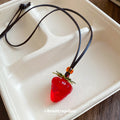 Red Strawberry Pendant Cord Necklace In Two Finishes view 4