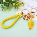 Yellow Leaf and Coin Charm Keychains with Fifteen Braided Strap Options view 7