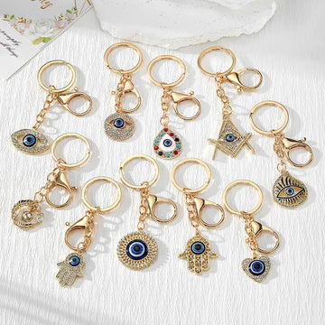 Blue Evil Eye Keychains with Twelve Symbol Charm Designs