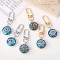 Gold and Silver Tone Blue Crystal Evil Eye Clip Keychains view 1