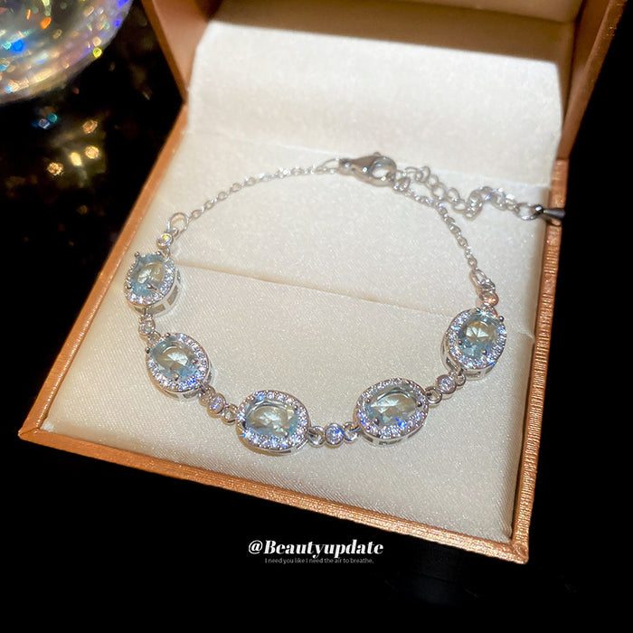 Silver Light Blue Oval Halo Stone Chain Bracelet Adjustable
