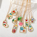 Gold Tone Pressed Flower Resin Pendant Necklaces in Eleven Shapes view 1