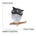 Single Eye Metal Owl on Branch Brooch in Brown and Blue view 7