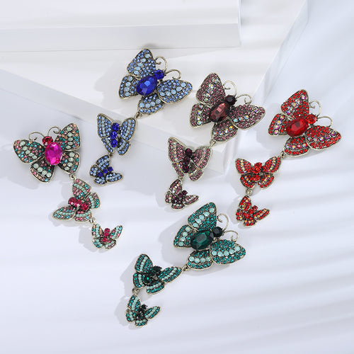 Three Butterfly Vine Brooch shown on a clean white display