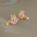 Gold Tone Pink Planet Bow And Clear Stone Stud Earrings view 6
