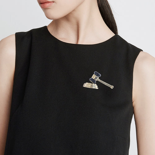 Silver gavel brooch product view on white steps