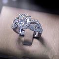 Silver Tone Round CZ Four Prong Twisted Pave Finger Ring view 2