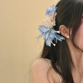 Purple White Fabric Flower Hair Claw With Mismatched Blue Gallery view 4