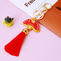 Red Enamel Dragon Fan Tassel Keychain with Gold Tone Hardware view 2