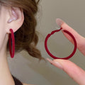 Large Glossy Round Hoop Earrings in Brown and Deep Red view 3
