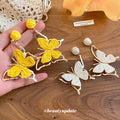 Layered Butterfly Drop Earrings in Yellow and White view 2