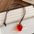 Red Strawberry Pendant Cord Necklace In Two Finishes view 2